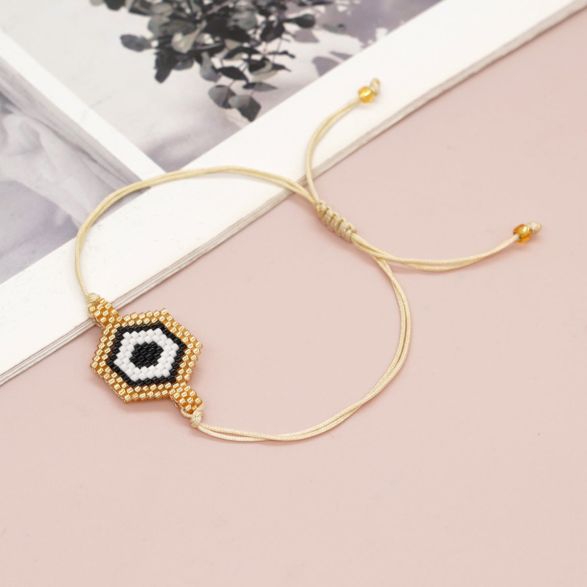 Bracelet de perles yeux du diable tissé à la main
