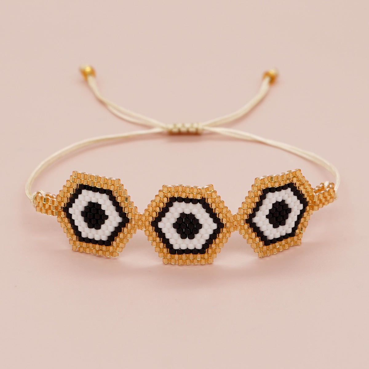 Bracelet de perles yeux du diable tissé à la main