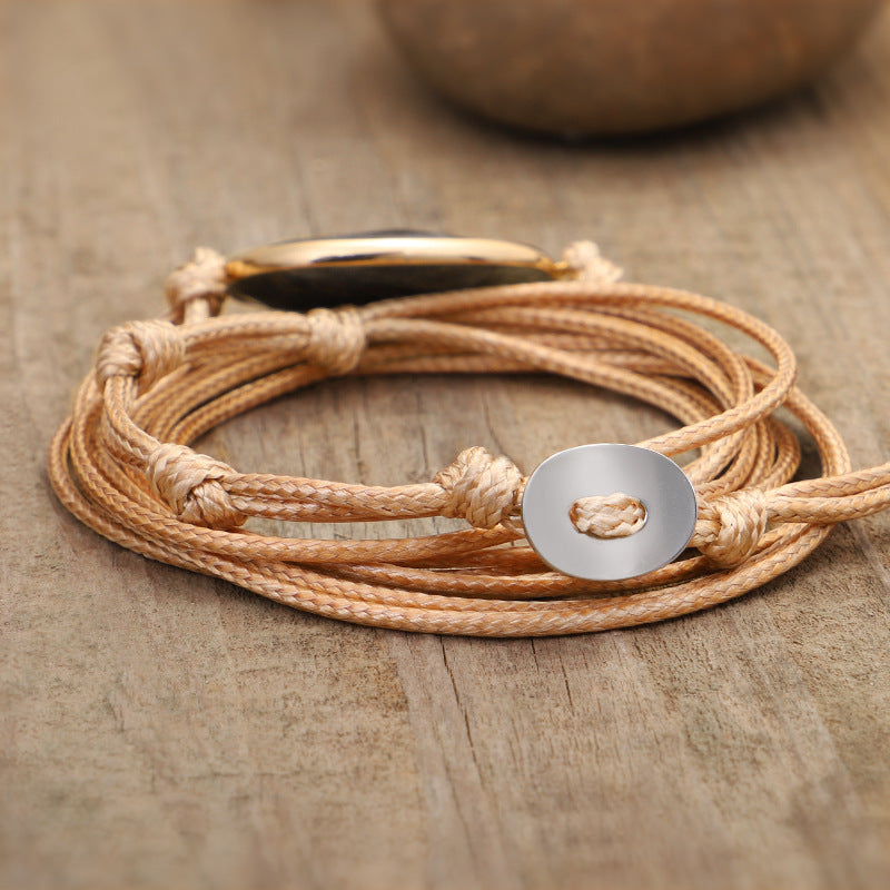 Bracelet en fil de cire tissé à la main avec plusieurs cercles en labradorite