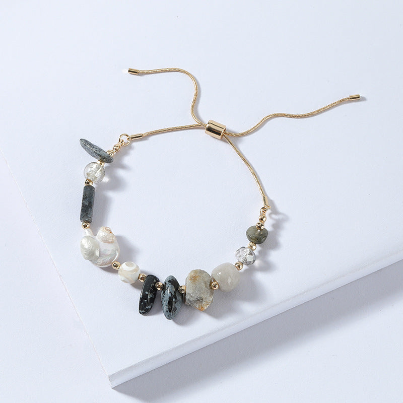 Bracelet original en perles d'eau douce et chaîne serpentine