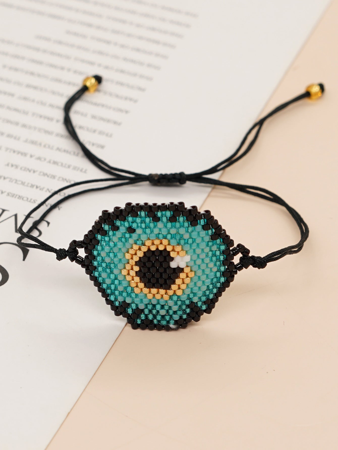 Bracelet de perles yeux du diable tissé à la main